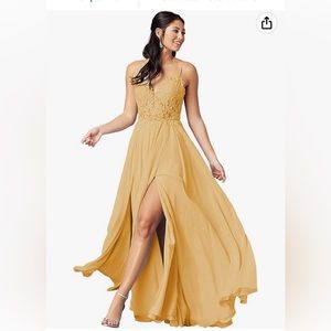 Size 2 gold cross back gown never worn